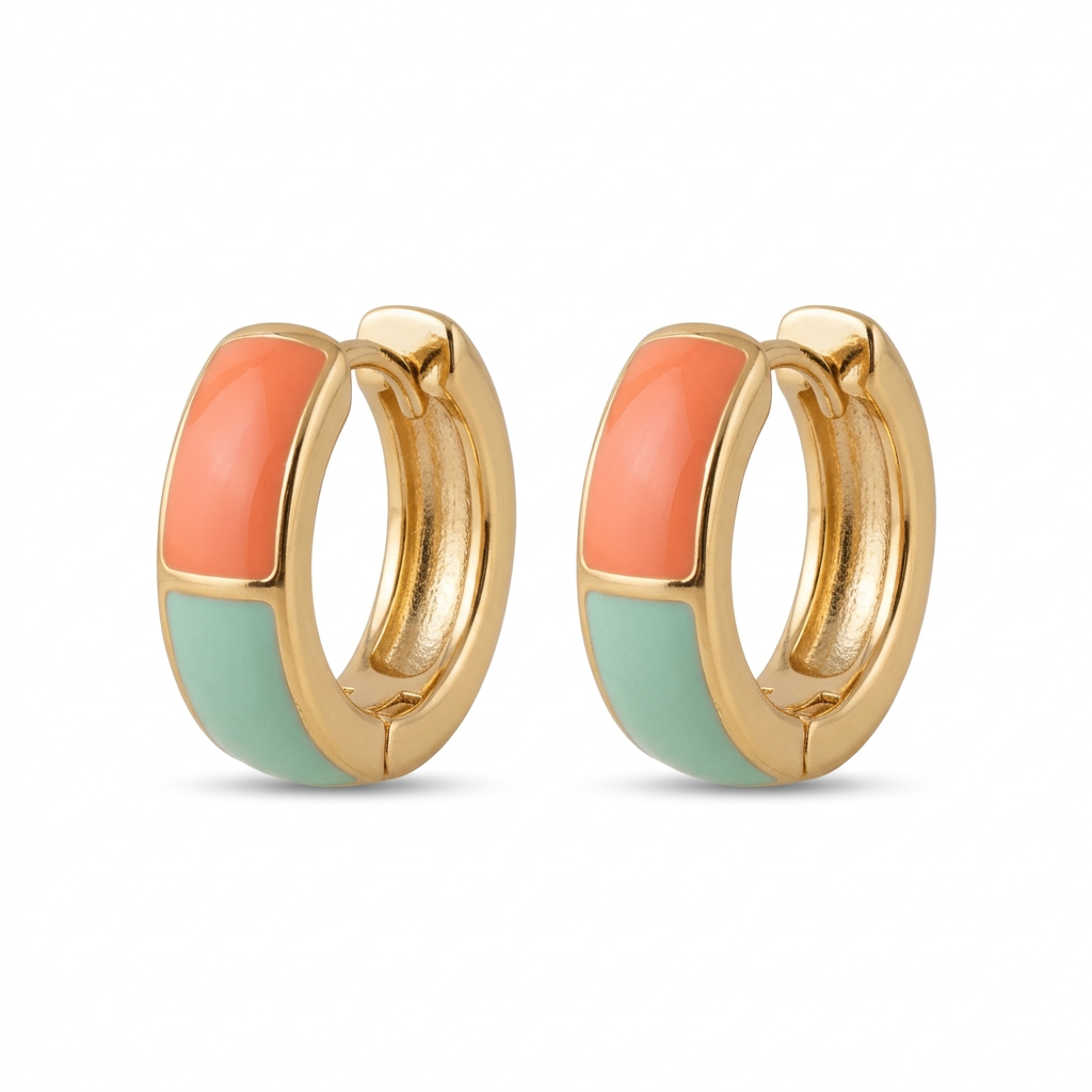 Coral and mint huggie earring pair on a white background